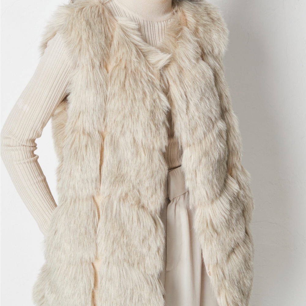 Beige cream vest fur vest with pockets and front snaps